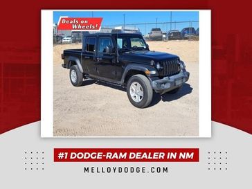 2020 Jeep Gladiator Sport in a Black Clear Coat exterior color and Blackinterior. Melloy Dodge RAM FIAT 505-588-4459 melloydodge.com 