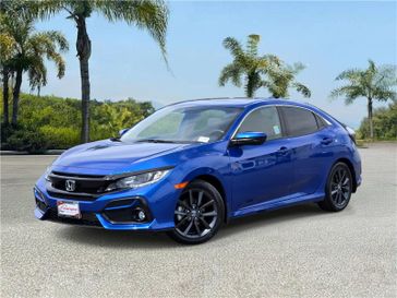 Used 2021 Honda Civic Hatchback EX CVT in a Blue exterior color and Blackinterior. Southbay Chrysler Jeep Dodge Ram (424) 404-5521 pixelmotiondemo.com 