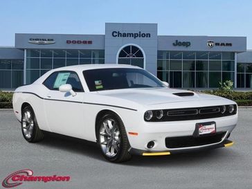 2023 Dodge Challenger Gt in a White Knuckle exterior color and HOUNDSTOOTHinterior. Champion Chrysler Jeep Dodge Ram 800-549-1084 pixelmotiondemo.com 
