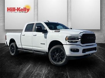 2024 RAM 2500 Big Horn Crew Cab 4x4 6'4' Box in a Bright White Clear Coat exterior color and Blackinterior. Hill-Kelly Dodge (850) 786-2130 hillkellydodge.com 