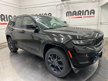 2024 Jeep Grand Cherokee Anniversary Edition 4xe in a Diamond Black Crystal Pearl Coat exterior color and Global Blackinterior. Marina Auto Group (855) 564-8688 marinaautogroup.com 