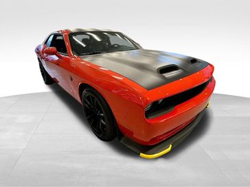 2023 Dodge Challenger SRT Hellcat Jailbreak in a Go Mango exterior color and Blackinterior. Sheridan Motors CDJR 307-218-2217 sheridanmotor.com 