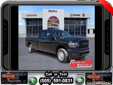 2024 RAM 2500 Tradesman Crew Cab 4x2 8' Box in a Diamond Black Crystal Pearl Coat exterior color and Blackinterior. Melloy Dodge RAM FIAT 505-588-4459 melloydodge.com 