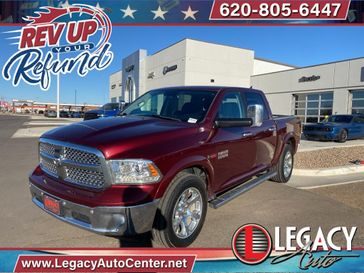 2017 RAM 1500 Laramie in a Delmonico Red Pearl Coat exterior color and Blackinterior. Legacy Auto Center 620-315-9264 legacyautocenter.net 