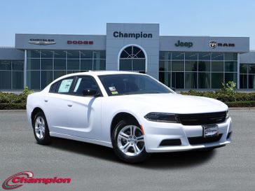 2023 Dodge Charger SXT Rwd in a White Knuckle exterior color and HOUNDSTOOTHinterior. Champion Chrysler Jeep Dodge Ram 800-549-1084 pixelmotiondemo.com 