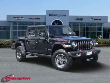 2023 Jeep Gladiator Rubicon 4x4 in a Black Clear Coat exterior color and PREM CLOTHinterior. Champion Chrysler Jeep Dodge Ram 800-549-1084 pixelmotiondemo.com 