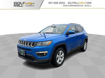 2021 Jeep Compass Latitude in a Laser Blue Pearl Coat exterior color and Blackinterior. Glenview Luxury Imports 847-904-1233 glenviewluxuryimports.com 