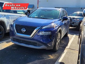 2022 Nissan Rogue SV in a Caspian Blue Metallic exterior color and Grayinterior. Melloy Dodge RAM FIAT 505-588-4459 melloydodge.com 