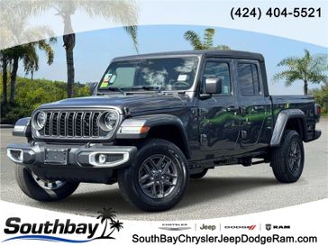 New 2026 Jeep Gladiator Sport S 4x4 in a Granite Crystal Metallic Clear Coat exterior color and Blackinterior. Southbay Chrysler Jeep Dodge Ram (424) 404-5521 pixelmotiondemo.com 