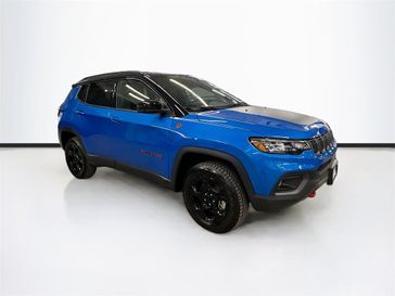 2024 Jeep Compass Trailhawk 4x4 in a Laser Blue Pearl Coat exterior color and Ruby Red/Blackinterior. Sheridan Motors Auto (307) 218-2217 sheridanmotors.com 