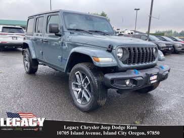 2024 Jeep Wrangler 4-door Sport S 4xe in a Anvil Clear Coat exterior color and Blackinterior. Legacy Chrysler Jeep Dodge RAM 541-663-4885 legacychryslerjeepdodgeram.com 