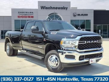 2024 RAM 3500 Big Horn Crew Cab 4x4 8' Box in a Diamond Black Crystal Pearl Coat exterior color and Diesel Gray/Blackinterior. Wischnewsky Dodge 936-755-5310 wischnewskydodge.com 