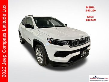 2023 Jeep Compass Latitude Lux 4x4 in a Bright White Clear Coat exterior color and Blackinterior. Sheridan Motors CDJR 307-218-2217 sheridanmotor.com 