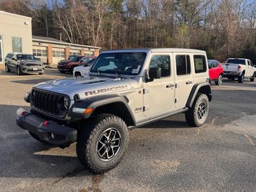 2024 Jeep Wrangler 4-door Rubicon in a Silver Zynith Clear Coat exterior color and Blackinterior. Guzik Motor Sales Inc Jeep 413-277-7648 guzikmotor.com 