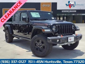 2023 Jeep Gladiator Mojave 4x4 in a Black Clear Coat exterior color and Blackinterior. Wischnewsky Dodge 936-755-5310 wischnewskydodge.com 