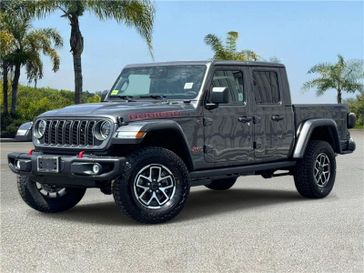 New 2026 Jeep Gladiator Rubicon X 4x4 in a Granite Crystal Metallic Clear Coat exterior color and Blackinterior. Southbay Chrysler Jeep Dodge Ram (424) 404-5521 pixelmotiondemo.com 