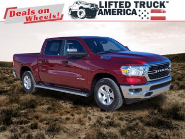 2024 RAM 1500 Big Horn in a Delmonico Red Pearl Coat exterior color and Diesel Gray/Blackinterior. Lifted Truck America 888-267-0644 liftedtruckamerica.com 