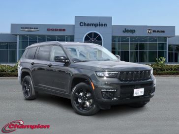 2022 Jeep Grand Cherokee L Limited in a Ember Pearl Coat exterior color and Global Blackinterior. Champion Chrysler Jeep Dodge Ram 800-549-1084 pixelmotiondemo.com 