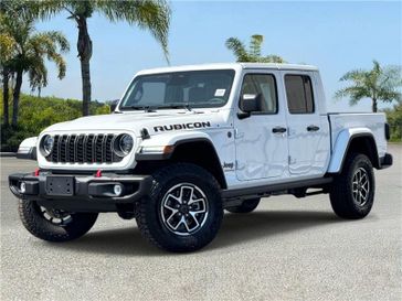 New 2026 Jeep Gladiator Rubicon X 4x4 in a Bright White Clear Coat exterior color and Blackinterior. Southbay Chrysler Jeep Dodge Ram (424) 404-5521 pixelmotiondemo.com 