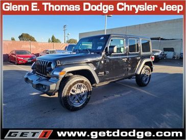 2024 Jeep Wrangler 4-door Sport S in a Black Clear Coat exterior color and Blackinterior. Glenn E Thomas 100 Years Of Excellence (866) 340-5075 getdodge.com 