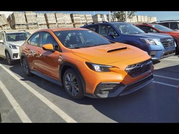 2023 Subaru WRX  in a Solar Orange Pearl exterior color. Ontario Auto Center ontarioautocenter.com 