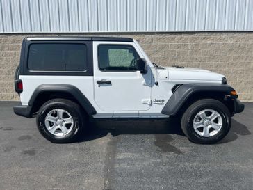 2020 Jeep Wrangler Sport S in a Bright White Clear Coat exterior color and Blackinterior. Wilmington Auto Center Chrysler Dodge Jeep Ram (937) 556-6430 wilmingtonautocentercdjr.com 