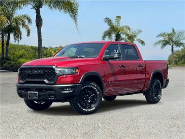 New 2026 RAM 1500 Rebel Crew Cab 4x4 5'7' Box in a Molten Red Pearl Coat exterior color and Blackinterior. Southbay Chrysler Jeep Dodge Ram (424) 404-5521 pixelmotiondemo.com 