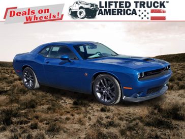 2023 Dodge Challenger R/T Scat Pack in a Frostbite exterior color and Blackinterior. Lifted Truck America 888-267-0644 liftedtruckamerica.com 