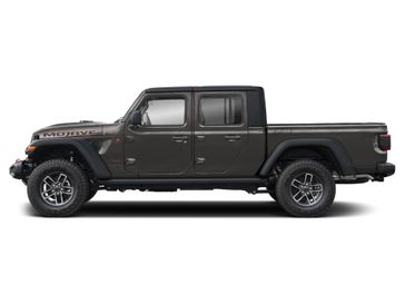 New 2026 Jeep Gladiator Mojave in a Granite Crystal Metallic Clear Coat exterior color and Blackinterior. Perkins La Junta 719-383-2250 perkinslajunta.com 