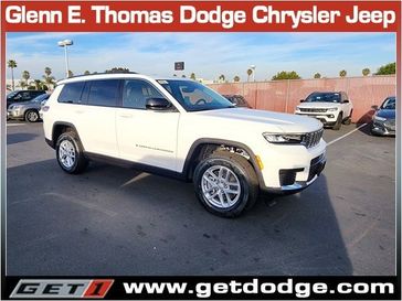2023 Jeep Grand Cherokee L Laredo 4x4 in a Bright White Clear Coat exterior color and Global Blackinterior. Glenn E Thomas 100 Years Of Excellence (866) 340-5075 getdodge.com 