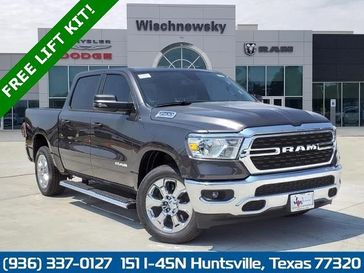 2023 RAM 1500 Lone Star Crew Cab 4x4 5'7' Box in a Granite Crystal Metallic Clear Coat exterior color and Blackinterior. Wischnewsky Dodge 936-755-5310 wischnewskydodge.com 