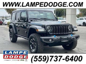 2024 Jeep Wrangler 4-door Rubicon 4xe in a Black Clear Coat exterior color and Blackinterior. Lampe Chrysler Dodge Jeep RAM 559-471-3085 pixelmotiondemo.com 