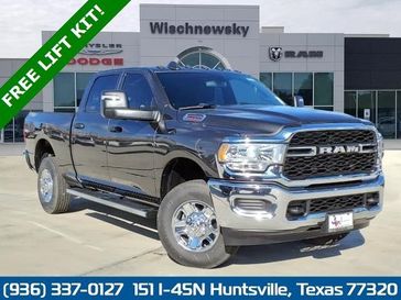 2024 RAM 2500 Tradesman Crew Cab 4x4 6'4' Box in a Granite Crystal Metallic Clear Coat exterior color and Blackinterior. Wischnewsky Dodge 936-755-5310 wischnewskydodge.com 