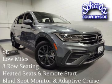 2023 Volkswagen Tiguan SE 7 Passenger Seating in a Platinum Gray Metallic exterior color and Black Heated Seatsinterior. Schmelz Countryside Alfa Romeo (651) 867-3222 schmelzalfaromeo.com 