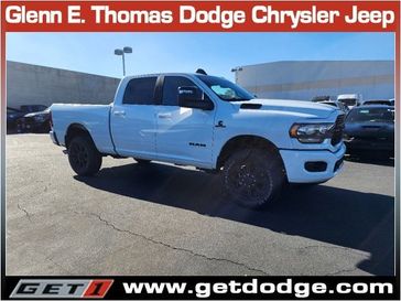 2024 RAM 2500 Big Horn Crew Cab 4x4 6'4' Box in a Bright White Clear Coat exterior color and Blackinterior. Glenn E Thomas 100 Years Of Excellence (866) 340-5075 getdodge.com 