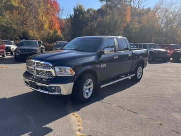 2018 RAM 1500 Laramie in a Maximum Steel Metallic Clear Coat exterior color and Blackinterior. Guzik Motor Sales Inc Jeep 413-277-7648 guzikmotor.com 