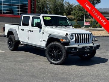 2020 Jeep Gladiator Sport S in a Bright White Clear Coat exterior color and Blackinterior. Glendora Chrysler Dodge Jeep Ram 909-506-2515 glendorachryslerjeepdodge.com 