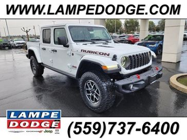 2024 Jeep Gladiator Rubicon X 4x4 in a Bright White Clear Coat exterior color and Blackinterior. Lampe Chrysler Dodge Jeep RAM 559-471-3085 pixelmotiondemo.com 