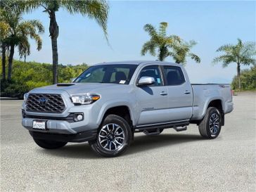 Used 2021 Toyota Tacoma TRD Sport Double Cab 6' Bed V6 AT (Natl) in a Cement exterior color and Black/Gun Metalinterior. Champion Alfa Romeo 562-454-0632 championalfaromeo.com 