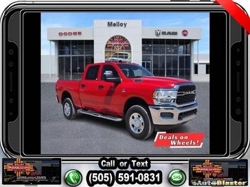 2024 RAM 2500 Tradesman Crew Cab 4x4 6'4' Box in a Flame Red Clear Coat exterior color. Melloy Dodge RAM FIAT 505-588-4459 melloydodge.com 