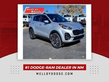 2020 Kia Sportage SX in a Sparkling Silver exterior color and Blackinterior. Melloy Dodge RAM FIAT 505-588-4459 melloydodge.com 