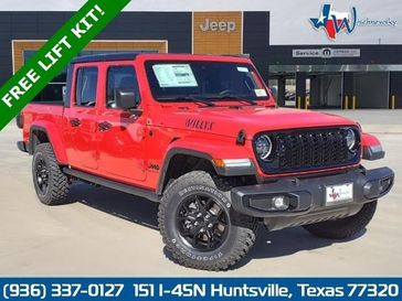 2024 Jeep Gladiator Willys 4x4 in a Firecracker Red Clear Coat exterior color. Wischnewsky Dodge 936-755-5310 wischnewskydodge.com 