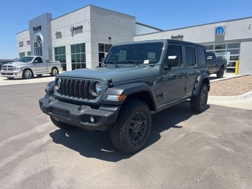 2024 Jeep Wrangler 4-door Sport S in a Anvil Clear Coat exterior color and Blackinterior. Legacy Auto Center 620-315-9264 legacyautocenter.net 