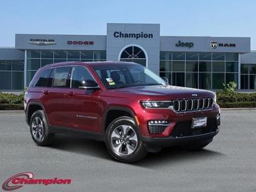 2023 Jeep Grand Cherokee 4xe in a Velvet Red Pearl Coat exterior color and CAPRI LEATHERinterior. Champion Chrysler Jeep Dodge Ram 800-549-1084 pixelmotiondemo.com 