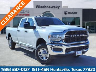 2024 RAM 2500 Tradesman Crew Cab 4x4 8' Box in a Bright White Clear Coat exterior color. Wischnewsky Dodge 936-755-5310 wischnewskydodge.com 