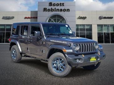 New 2026 Jeep Wrangler  in a Gray exterior color and Blackinterior. Southbay Chrysler Jeep Dodge Ram (424) 404-5521 pixelmotiondemo.com 