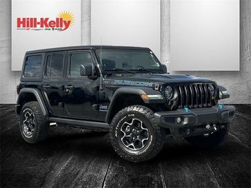 2023 Jeep Wrangler 4xE Rubicon 4xe in a Black Clear Coat exterior color and Blackinterior. Hill-Kelly Dodge (850) 786-2130 hillkellydodge.com 