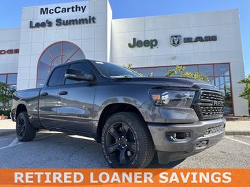 2023 RAM 1500 Big Horn Quad Cab 4x2 6'4' Box in a Granite Crystal Metallic Clear Coat exterior color and Blk Deluxe Clthinterior. McCarthy Jeep Ram 816-434-0674 mccarthyjeepram.com 