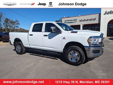 2024 RAM 2500 Tradesman Crew Cab 4x4 6'4' Box in a Bright White Clear Coat exterior color and Blackinterior. Johnson Dodge 601-693-6343 pixelmotiondemo.com 