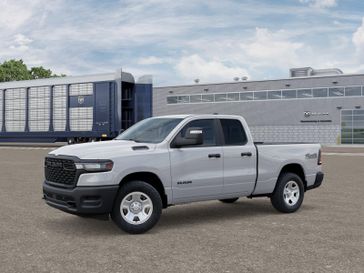 New 2025 RAM 1500 Tradesman Quad Cab 4x4 6'4' Box in a Bright White Clear Coat exterior color. Kamaaina Motors 1-808-746-7956 kamaainamotors.com 